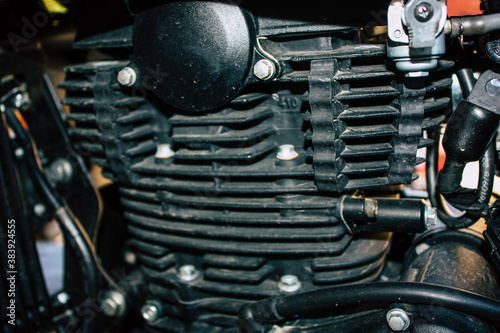 Closeup of a motorcycle parked in the streets of the city center of the metropolitan area 