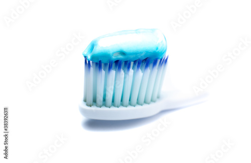 Toothbrush with toothpaste close up. Cleaning teeth concept.