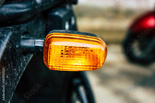 Closeup of a motorcycle parked in the streets of the city center of the metropolitan area 