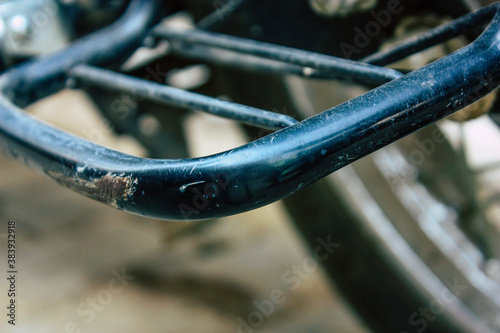 Closeup of a motorcycle parked in the streets of the city center of the metropolitan area
 photo