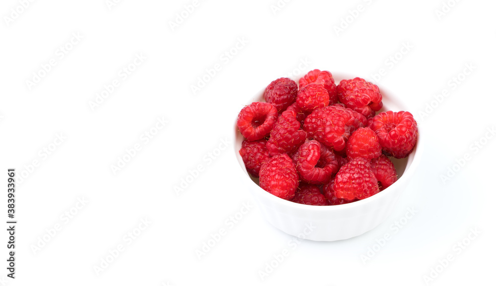 Raspberry isolated on a white background, side view with space to copy. Berry background-panorama. The concept of natural products. Raspberry isolated on a white background, side view with space to copy. Berry background-panorama. The concept of natural products.