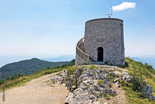 The Vojak observation Tower or Stone viewing tower at Vojak peak or Kula na Vojaku - Nature Park Ucka, Croatia / Razgledna kamena kula na Vojaku ili Vidikovac kula Vojak - Park prirode Učka, Hrvatska photo