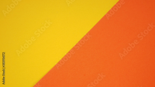 Empty paper in yellow and orange color for background.