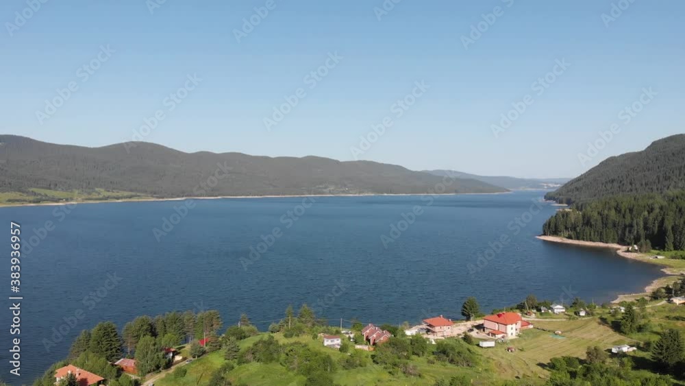 Aerial view from high mountain dam located in Bulgaria Aerial view from high mountain dam located in Bulgaria