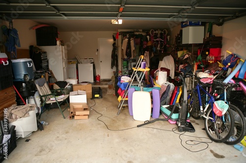 messy abandoned garage full of stuff photo