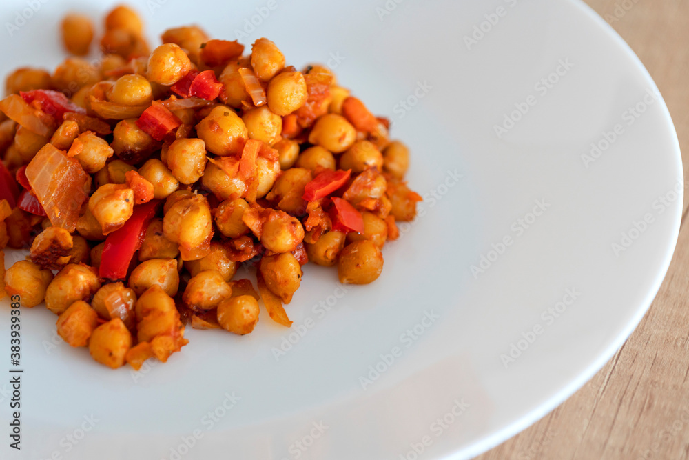 cooked beans on a plate, vegetarian dish, cooked chickpeas cooked beans on a plate, vegetarian dish, cooked chickpeas