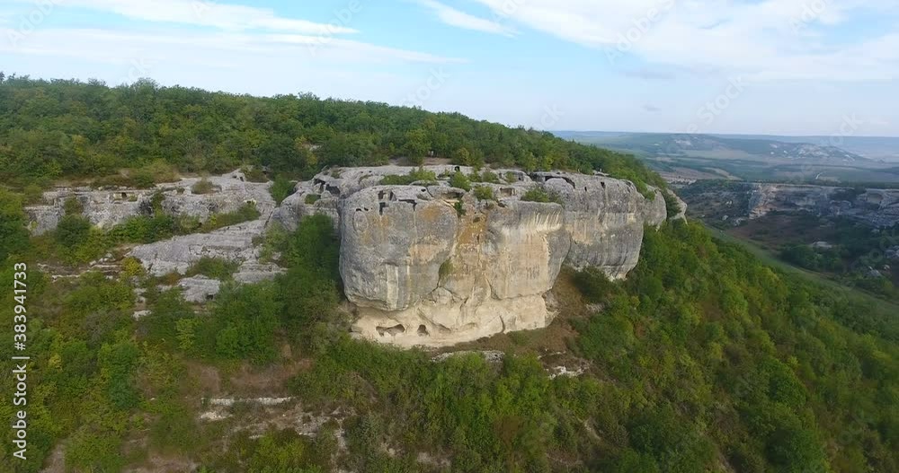 Aerial view on Crimea nature, rocks and mountains. Flying close to huge rock cliff. Crimea landscape with cliffs and mountains. Steep cliff face and mountain line. 4 k video Aerial view on Crimea nature, rocks and mountains. Flying close to huge rock cliff. Crimea landscape with cliffs and mountains. Steep cliff face and mountain line. 4 k video
