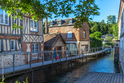 Fototapeta Naklejka Na Ścianę i Meble -  Building reflection in river, Bernay Normandy,France, eptember 2020