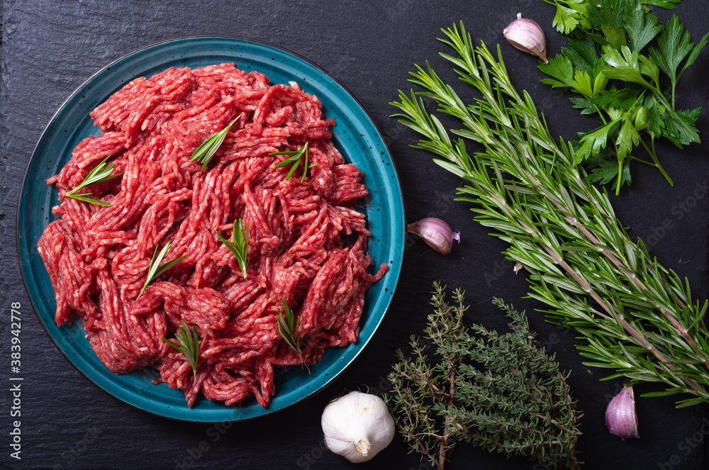 Fototapeta premium raw beef ground with ingredient