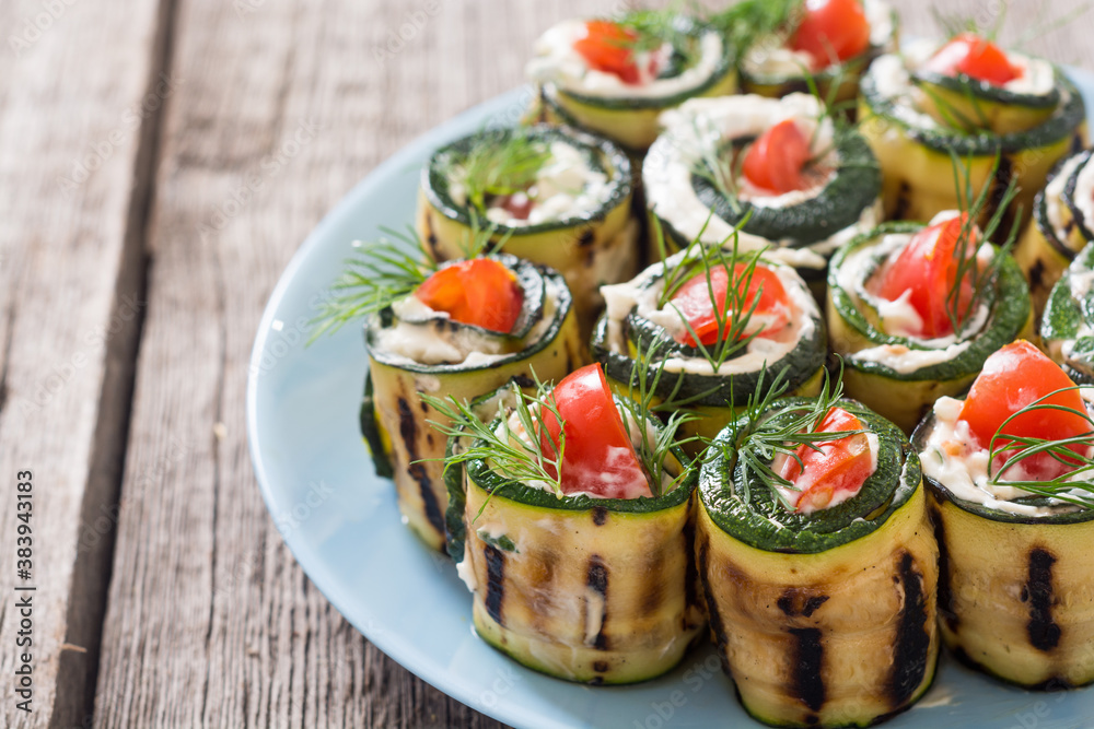 Zucchini rolls with cream cheese , tomatoes and dill Zucchini rolls with cream cheese , tomatoes and dill