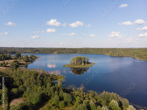 Beautiful island in the middle of a large lake © Yakovlev