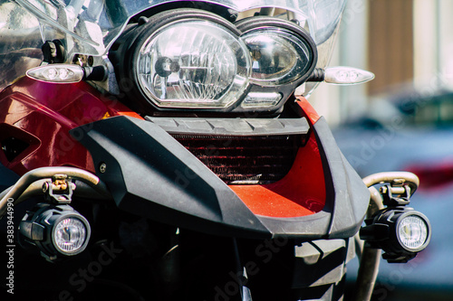 Closeup of a motorcycle parked in the streets of the city center of the metropolitan area 
