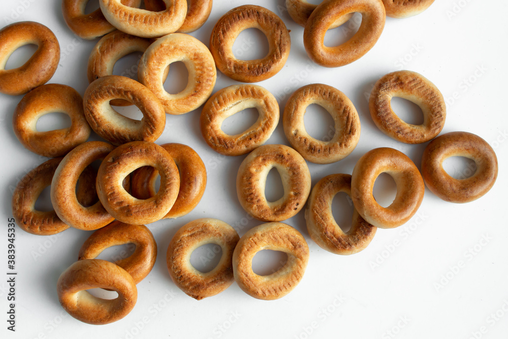 Pile of crispy cracknels isolated on white background, dessert for tea, baked dry bagels Pile of crispy cracknels isolated on white background, dessert for tea, baked dry bagels