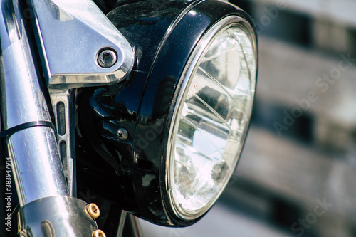 Closeup of a motorcycle parked in the streets of the city center of the metropolitan area 