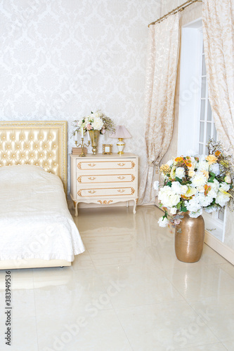 Luxury elegant white with gold interior design of bedroom