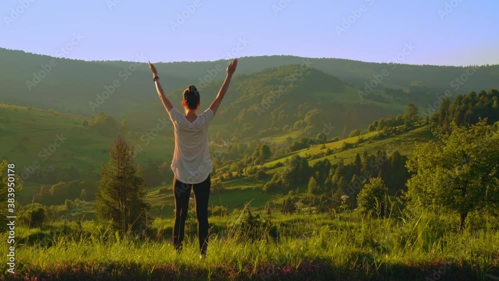 inspiration and motivation yoga lifestyle back view woman trains at sunrise in highland beautiful summer mountains landscape outdoors inspiration and motivation yoga lifestyle back view woman trains at sunrise in highland beautiful summer mountains landscape outdoors