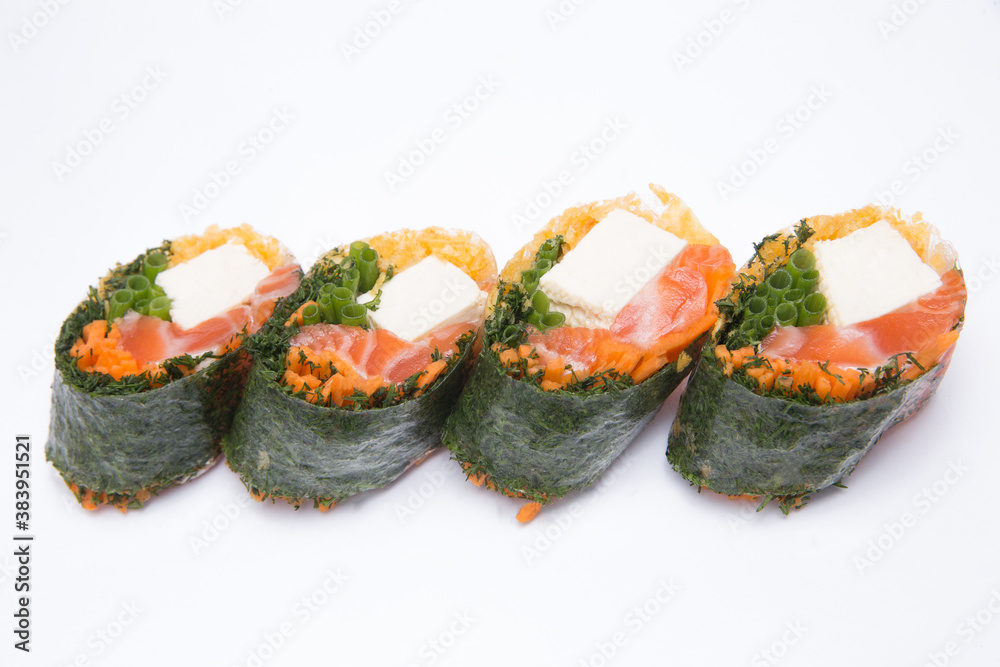Rolls with red fish feta greens lie on isolated background