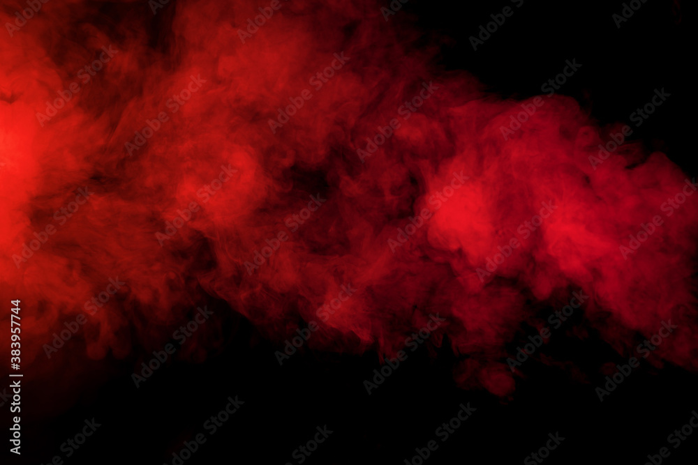 Red smoke on black background