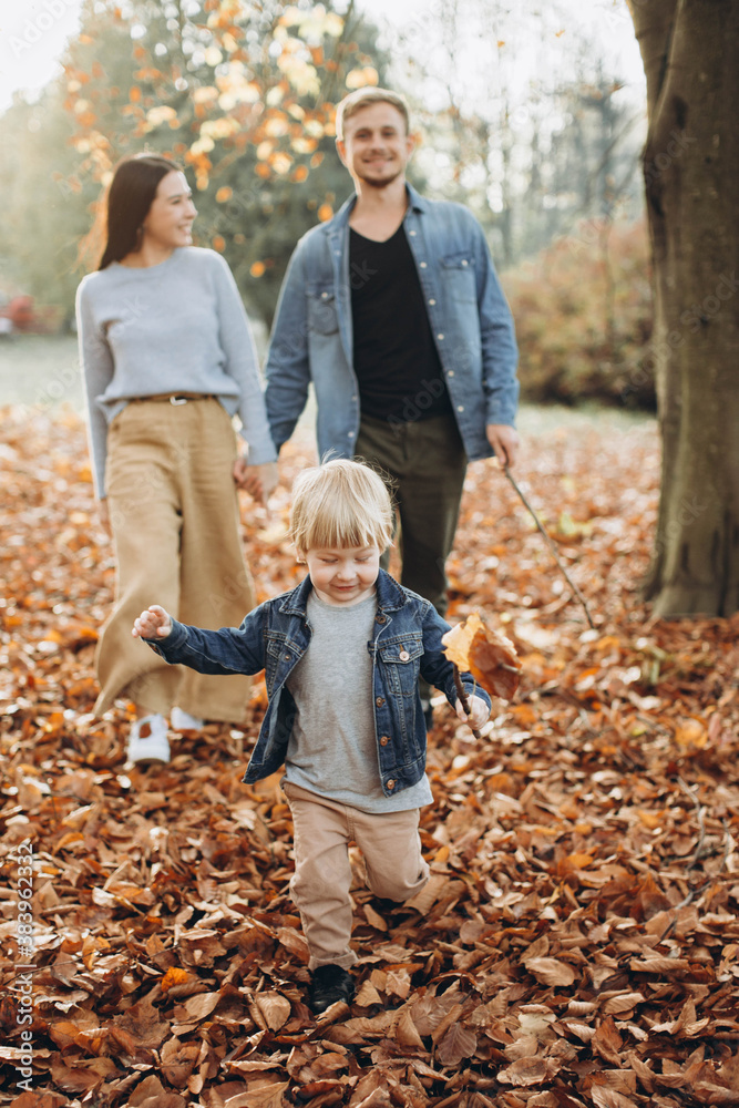 Fototapeta premium happy family in autumn park