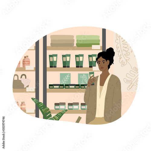 Black girl reading ingredients of organic bodycare product in cosmetics store