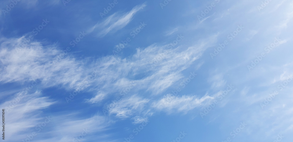 White clouds in the blue clear sky