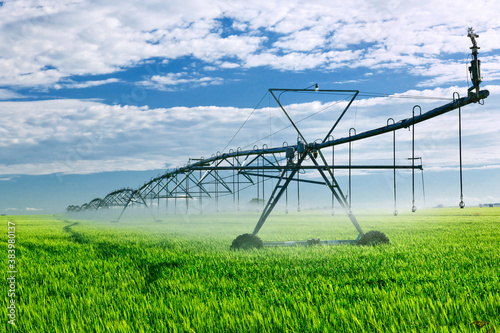 Obraz na plátně Irrigation equipment on farm field