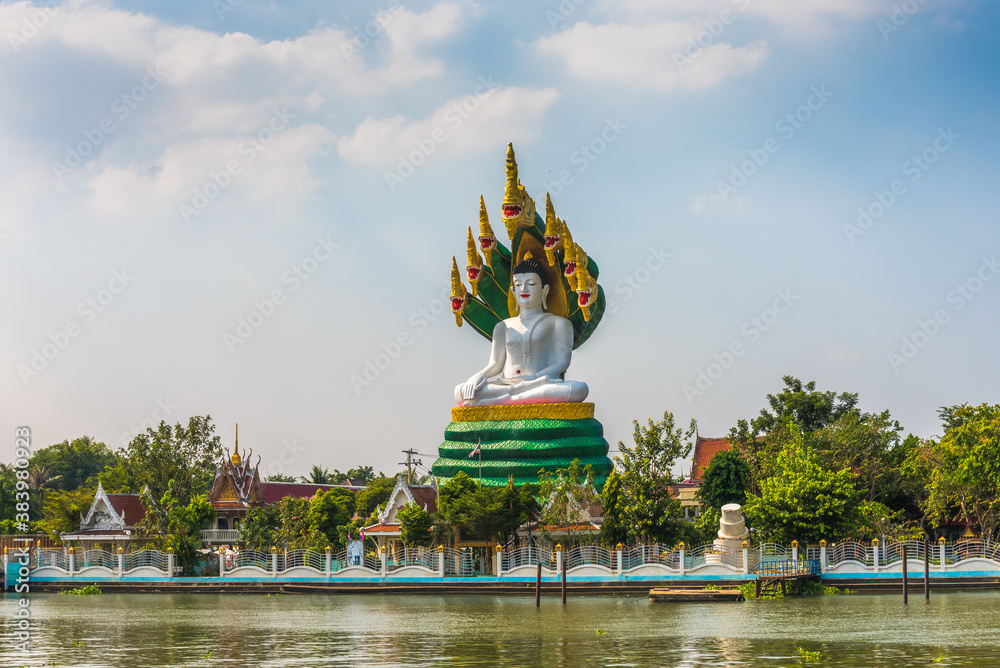 Big Buddha Statue at Wat Daeng Thammachat. Buddhist Temple on Chao Phraya River in Bangkok, Thailand.