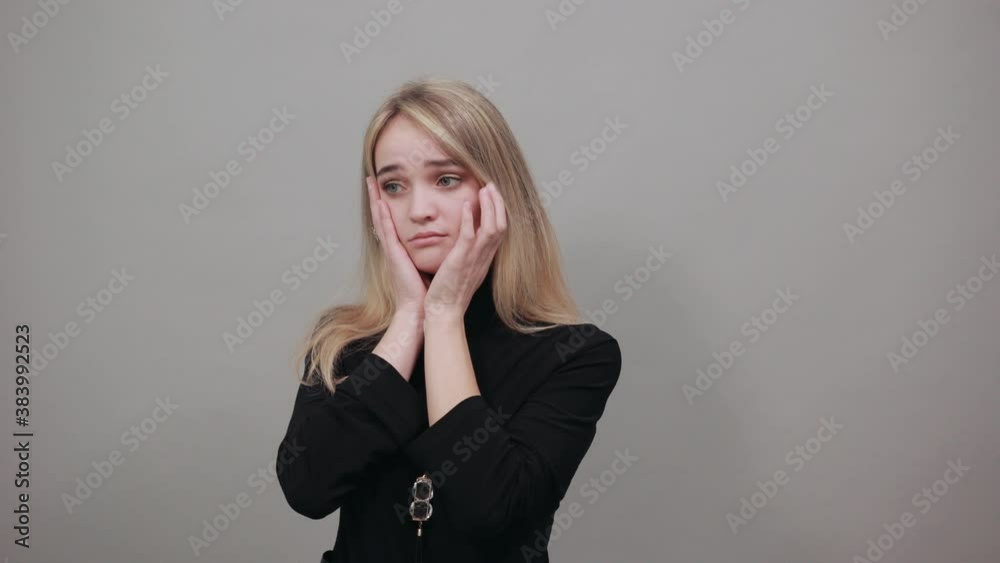 Keeping raised palm on cheek, looking gently, lovely calm attractive with appealing look, satisfied after visit cosmetologist, leaning head on hand touching face gentle as tilting, sensual gaze.