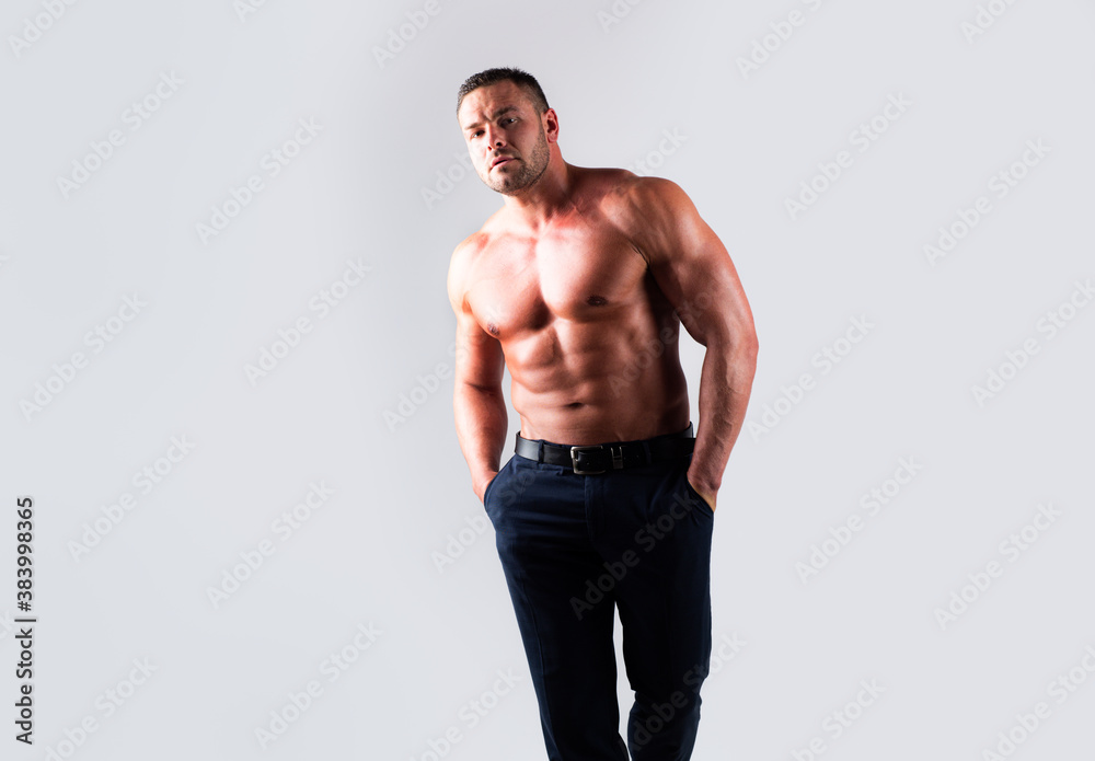 Muscular guy with sexy torso. Handsome masculine man.