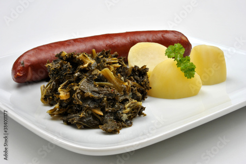 smoked sausage with potato and curley kale photo