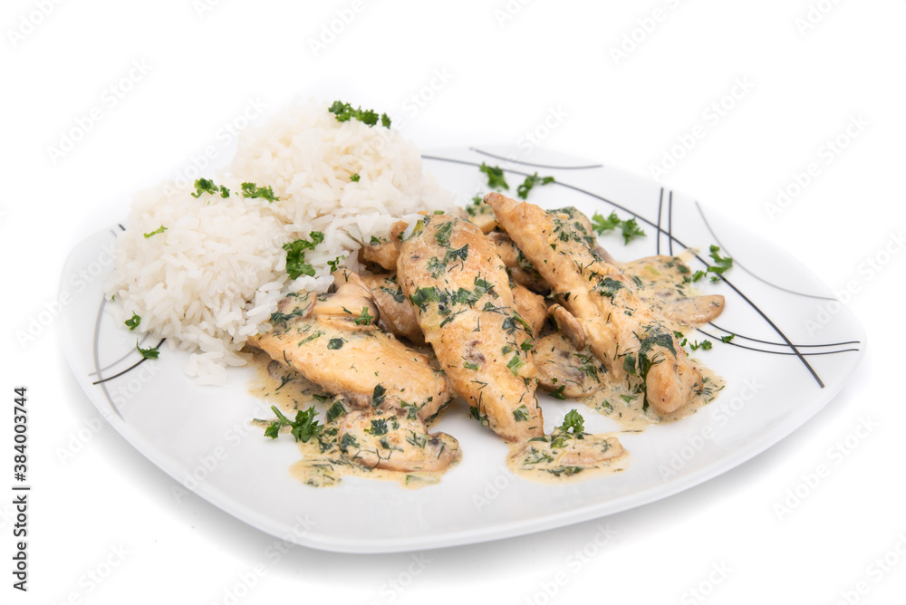 Creamy Herb Mushroom Chicken with steamed rice, dill and parsley on plate isolated on white background
