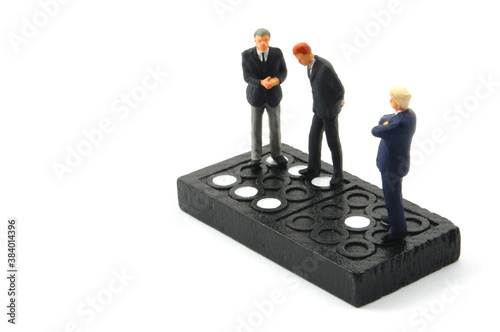 business man on domino isolated photo