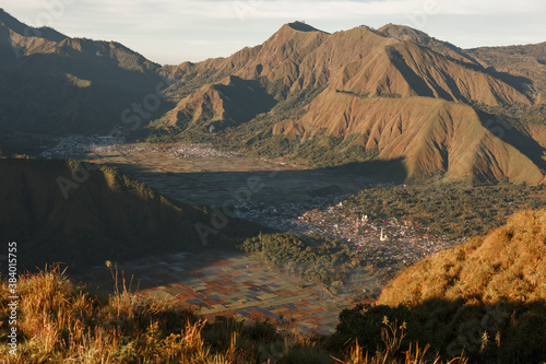 Sembalun village landscape in east lombok filled with fog in the morning, view from Pergasingan Hill