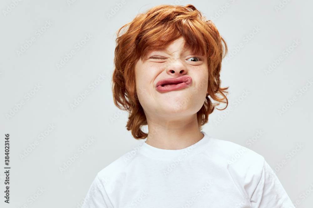 redhead boy grimacing cropped view studio redhead boy grimacing cropped view studio