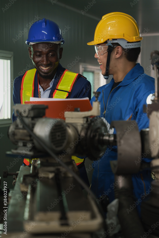 metal work factory technician inspector and worker in lathe workshop metal work factory technician inspector and worker in lathe workshop