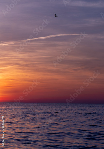Setting sun with a brilliant sunset over Lake Michigan USA 