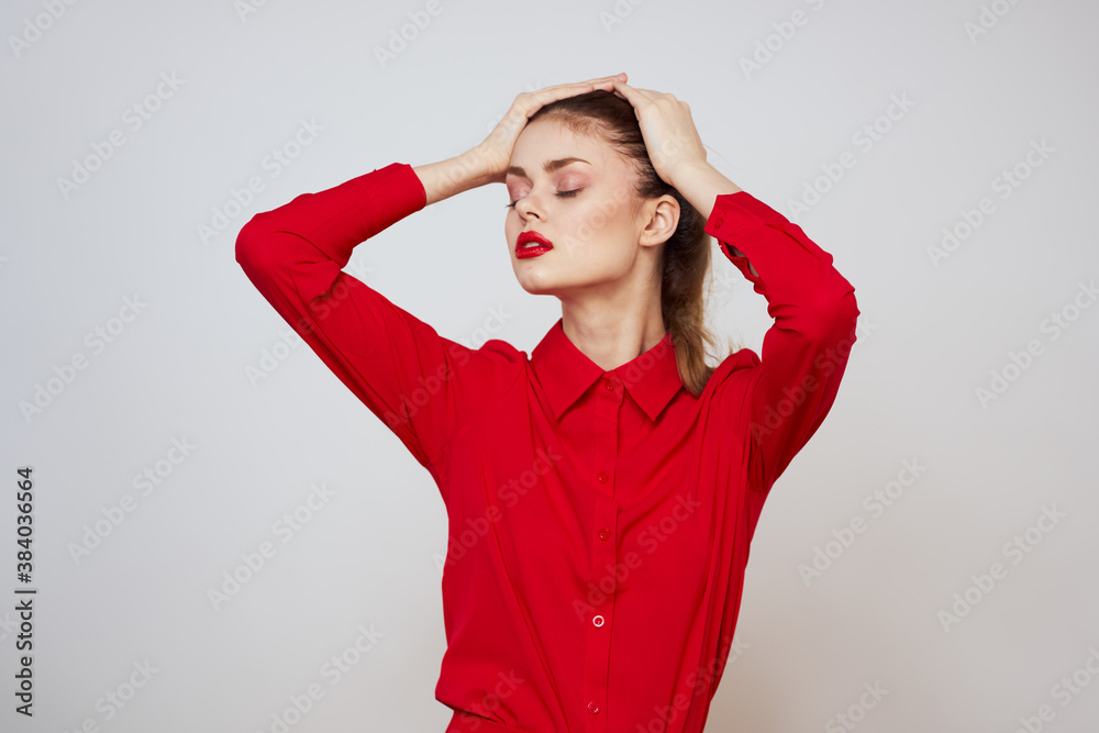portrait of a woman with red lips in a shirt on a light background cropped view model makeup hairstyle portrait of a woman with red lips in a shirt on a light background cropped view model makeup hairstyle