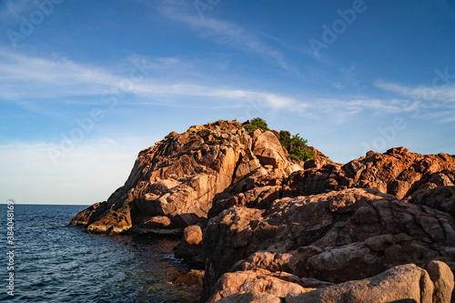 A tropical island with Cliffs and perfect bly sky at Long Beach Redang Islands, Malaysia © zahidi