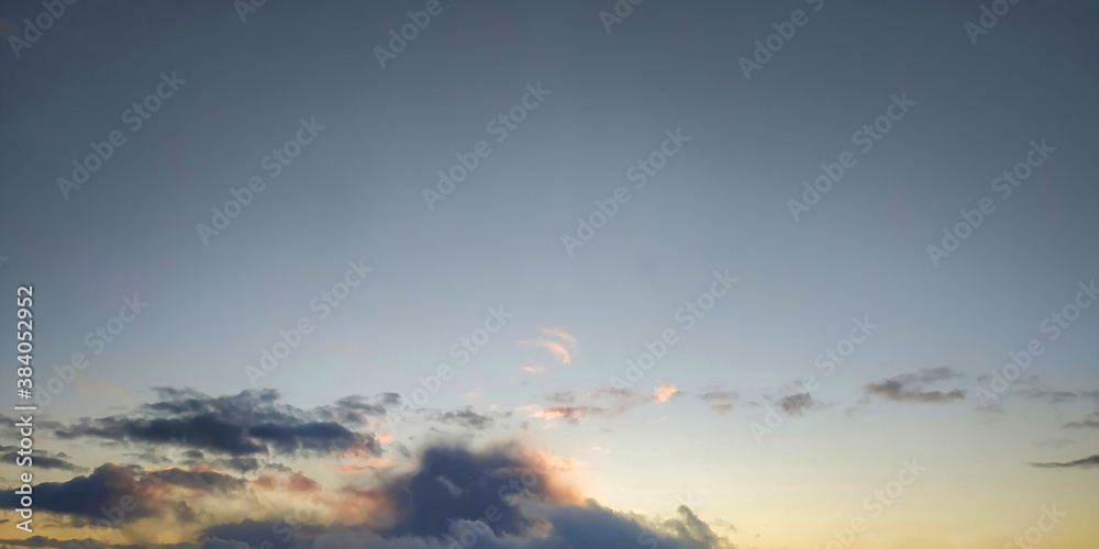 Fototapeta premium Evening sky, clouds, sun and sunset