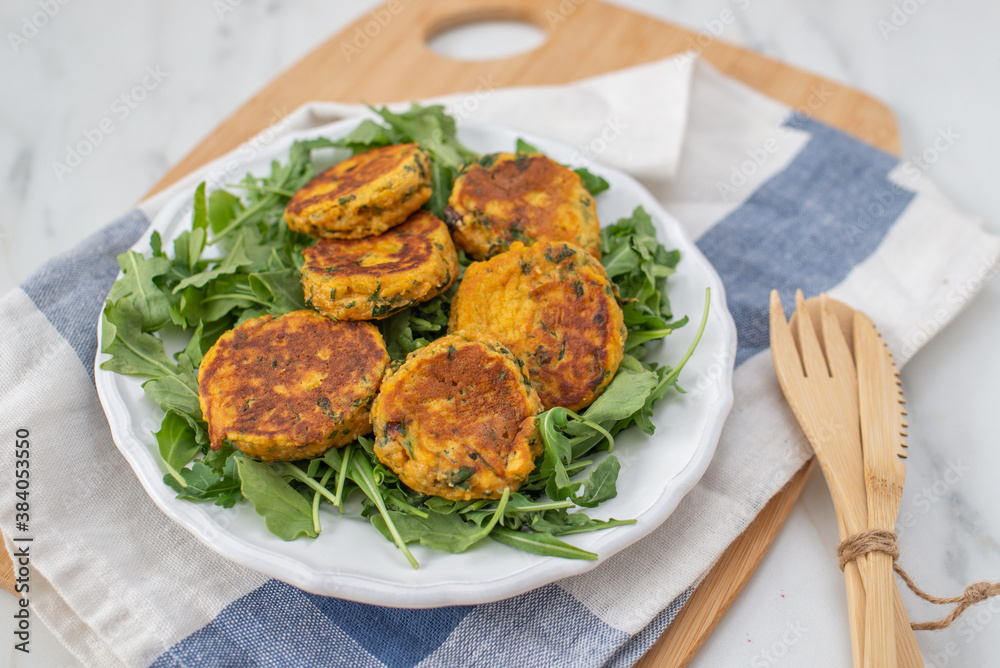 Homemade fried sweet potato cakes on a plate