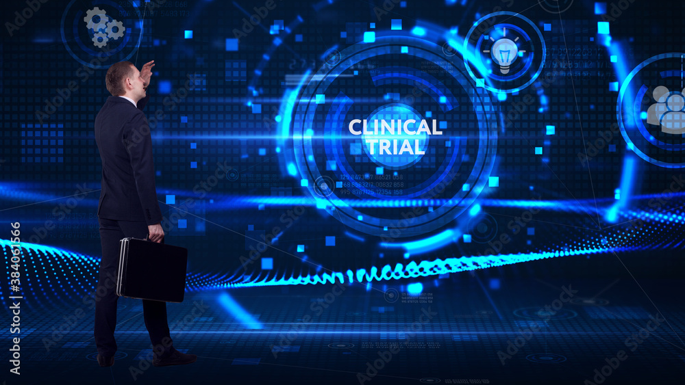 Business, technology, internet and network concept. Young businessman thinks over the steps for successful growth: Clinical trial Business, technology, internet and network concept. Young businessman thinks over the steps for successful growth: Clinical trial