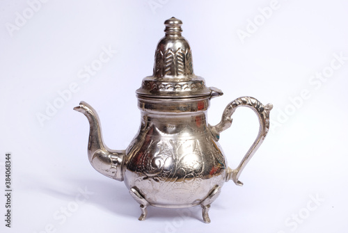 silver antique jug on white background