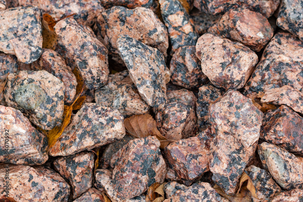 The texture of crushed stone of pink marine The texture of crushed stone of pink marine