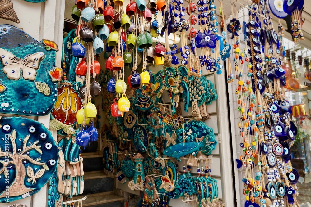 Bodrum, Turkey - August, 2020: souvenirs with evil eyes, masks, lanterns at the local market. Turkish souvenirs of Grand Bazaar. With selective focus