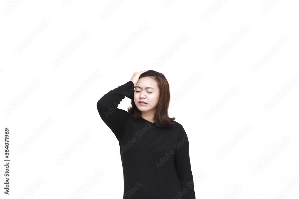 Portrait of young asian woman isolated on white background suffering from severe headache, pressing fingers to temples, closing eyes to relieve pain with helpless face expression. Portrait of young asian woman isolated on white background suffering from severe headache, pressing fingers to temples, closing eyes to relieve pain with helpless face expression.