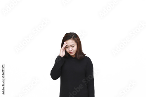 Portrait of young asian woman isolated on white background suffering from severe headache, pressing fingers to temples, closing eyes to relieve pain with helpless face expression.