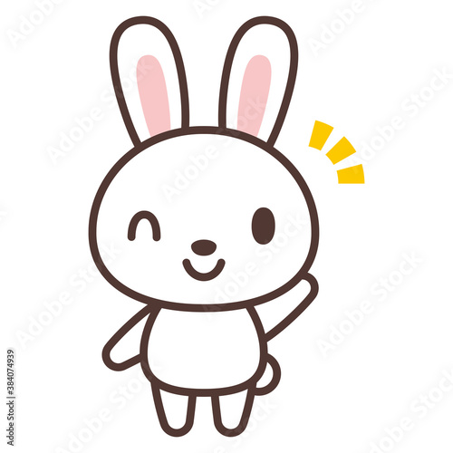 手を上げるかわいいうさぎのキャラクター