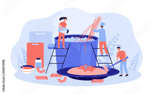 Restaurant chef and his team cooking pasta. Cooks placing spaghetti in hot water and preparing plate for serving dinner. For traditional Italian cuisine, food, catering, job concept