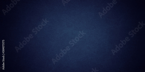 Texture of old navy blue paper closeup 