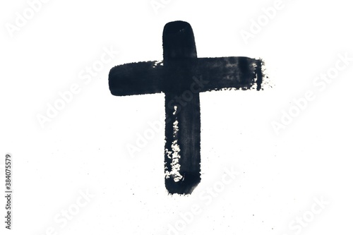 Black hand drawn cross symbol isolated on white background